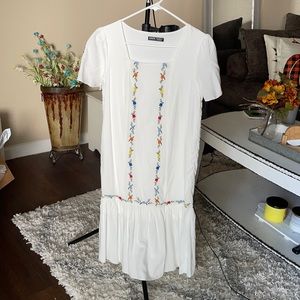 White embroidered midi dress.